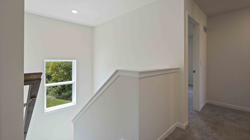 Upstairs hallway with large window