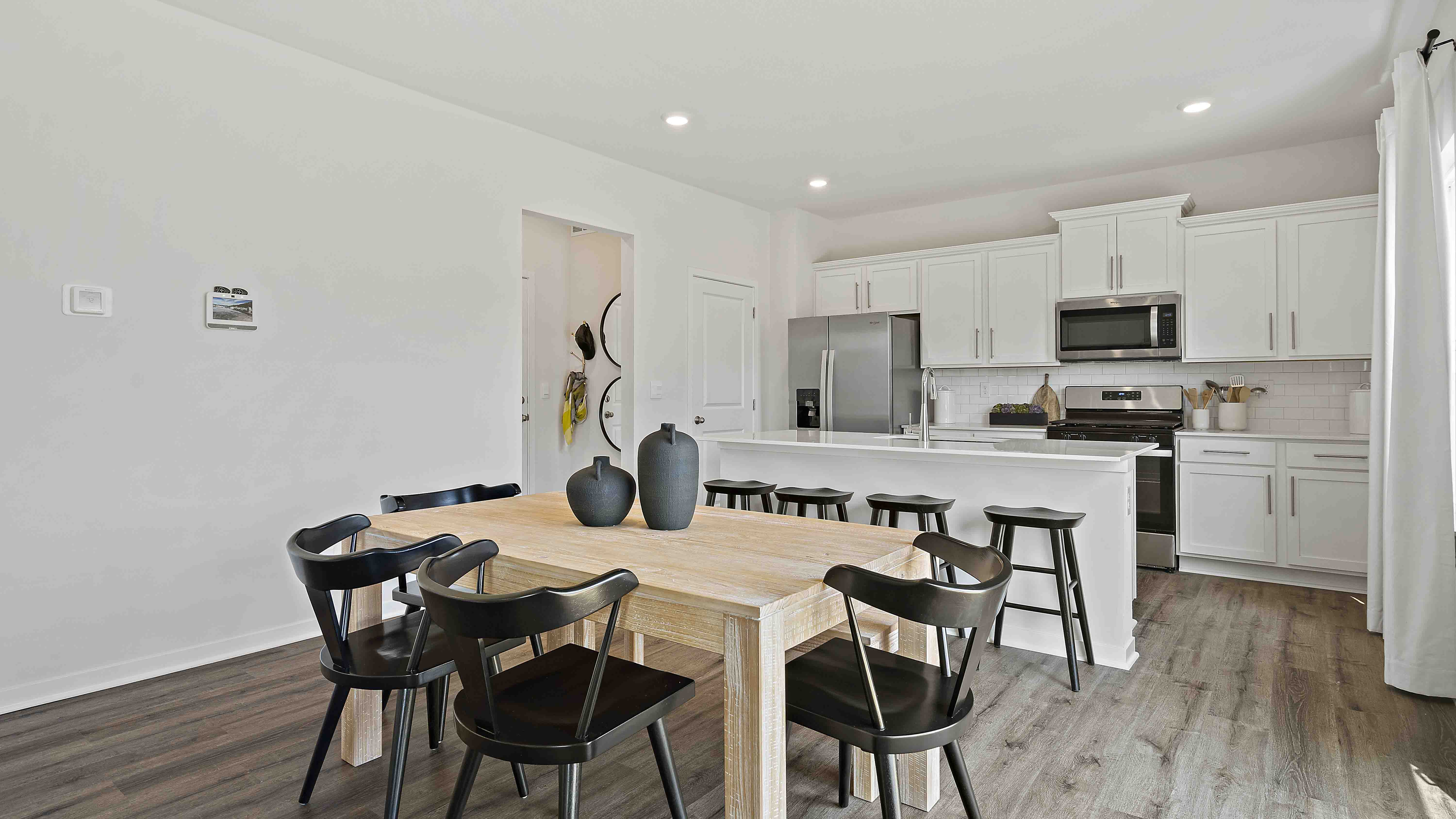 Dining area off of kitchen with large glass sliding door