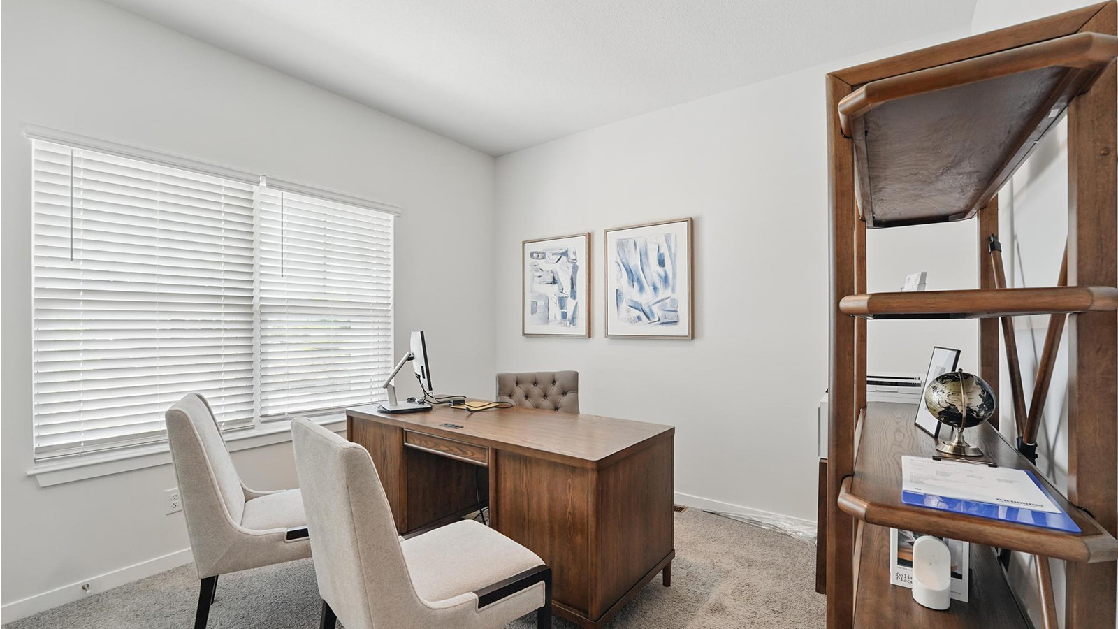 Carpeted bedroom with large windows