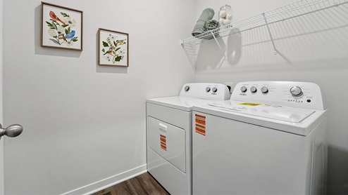 laundry room with side by side washer and dryer