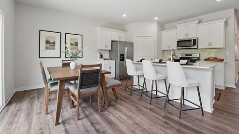 spacious dining room next to the kitchen