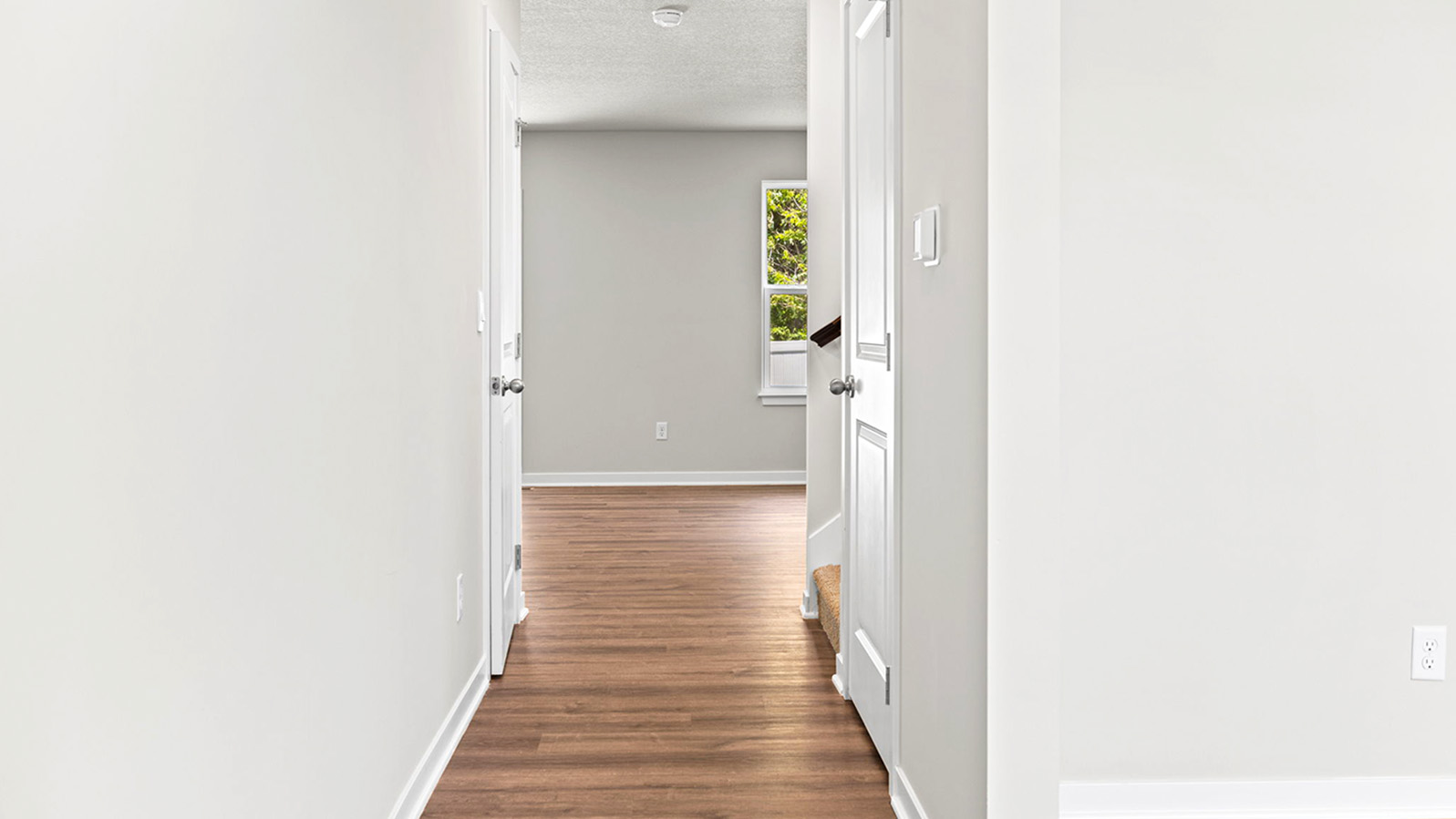 Welcoming foyer with view of staircase.