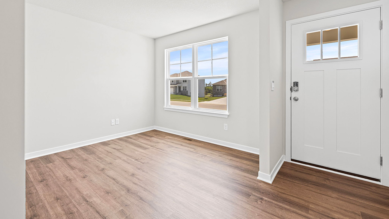 Welcoming foyer with view of staircase.