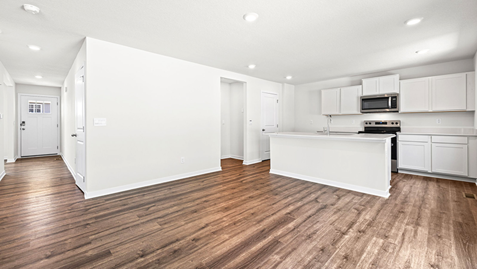 Dining area beside kitchen and living room.
