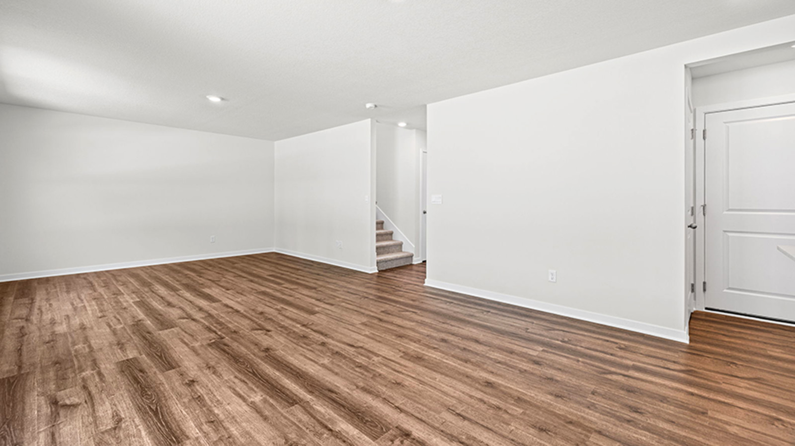 Dining area beside kitchen and living room.