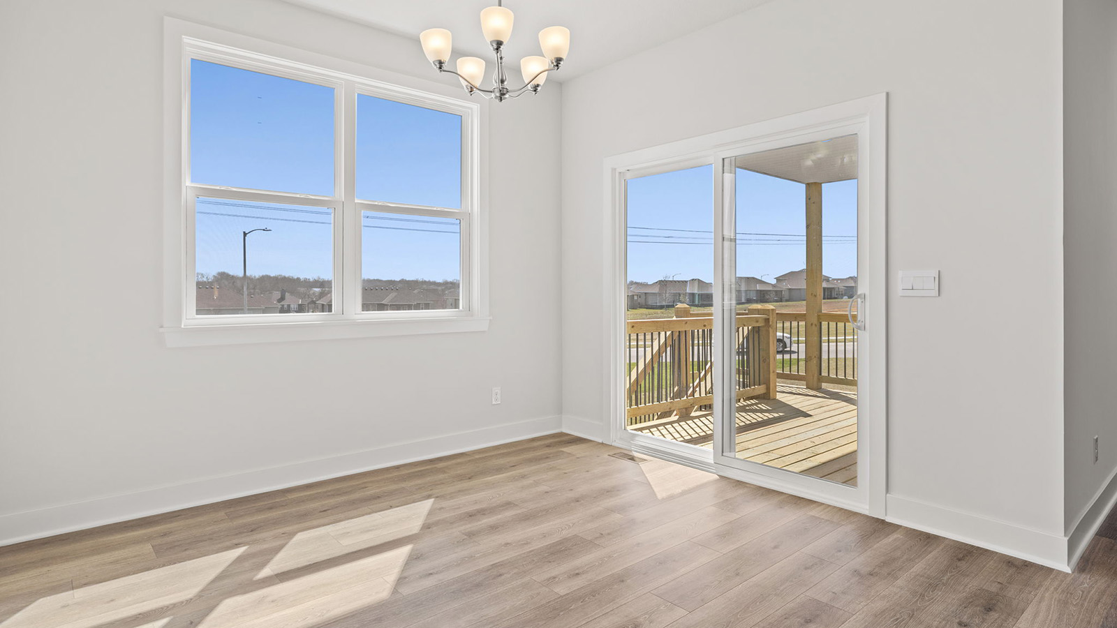 Dining area off of kitchen with glass sliding door