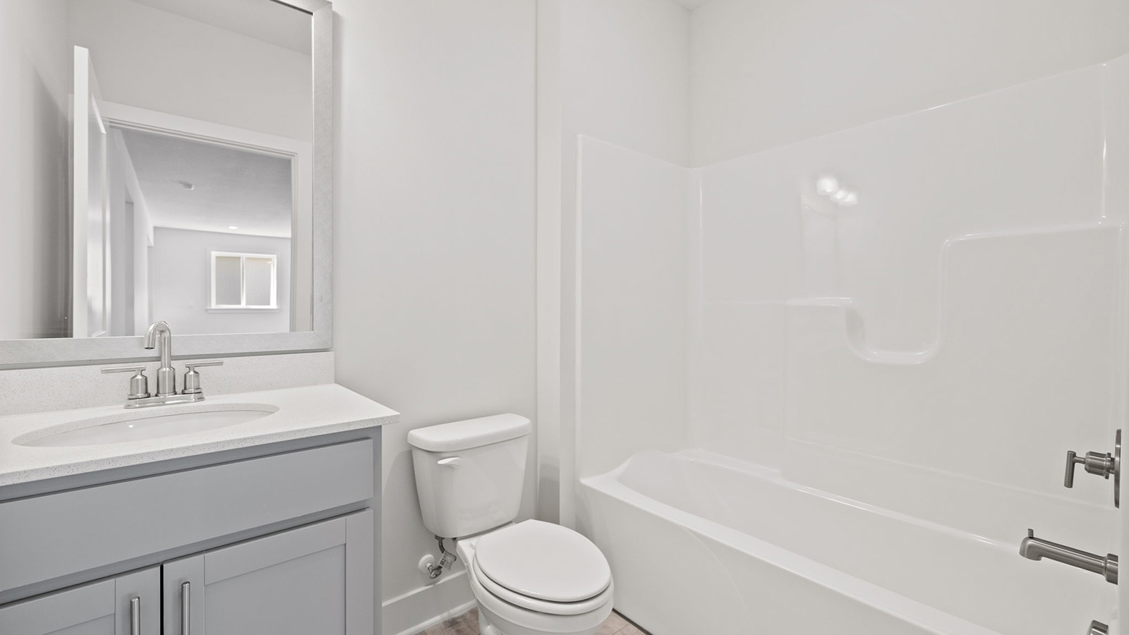 Bathroom with a bathtub shower combination