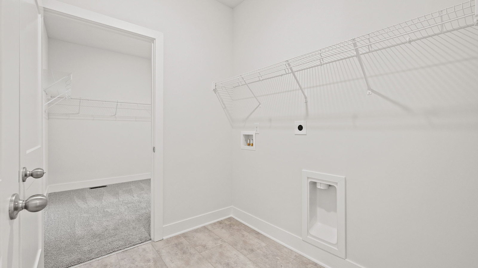 Laundry room connected to primary closet
