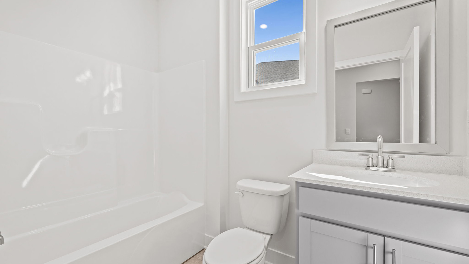 Bathroom with a bathtub shower combination