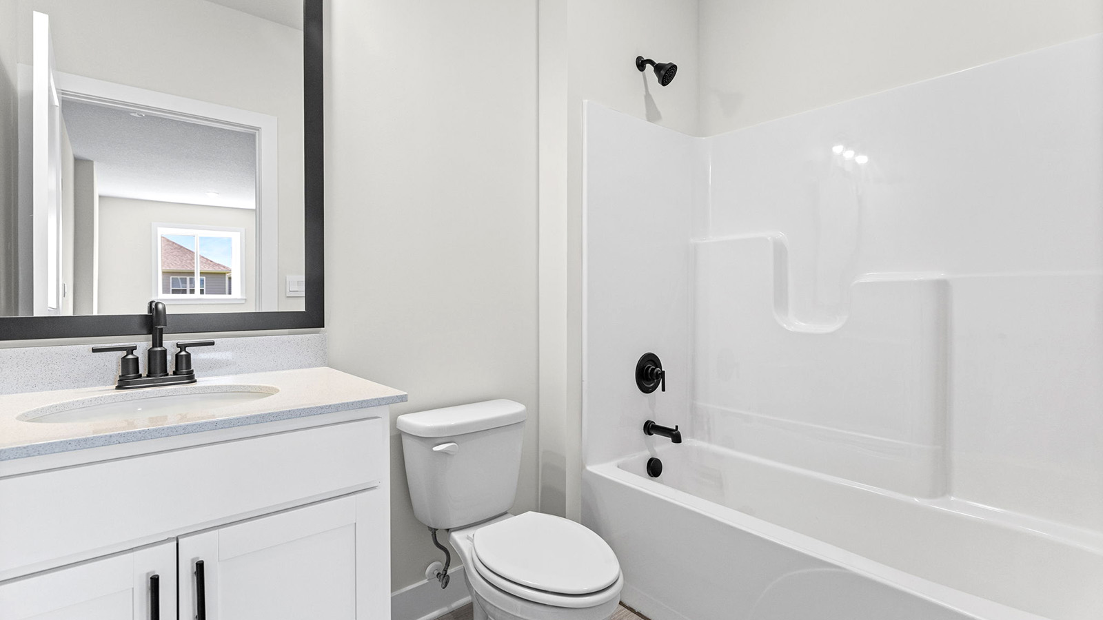 Bathroom with a bathtub shower combination