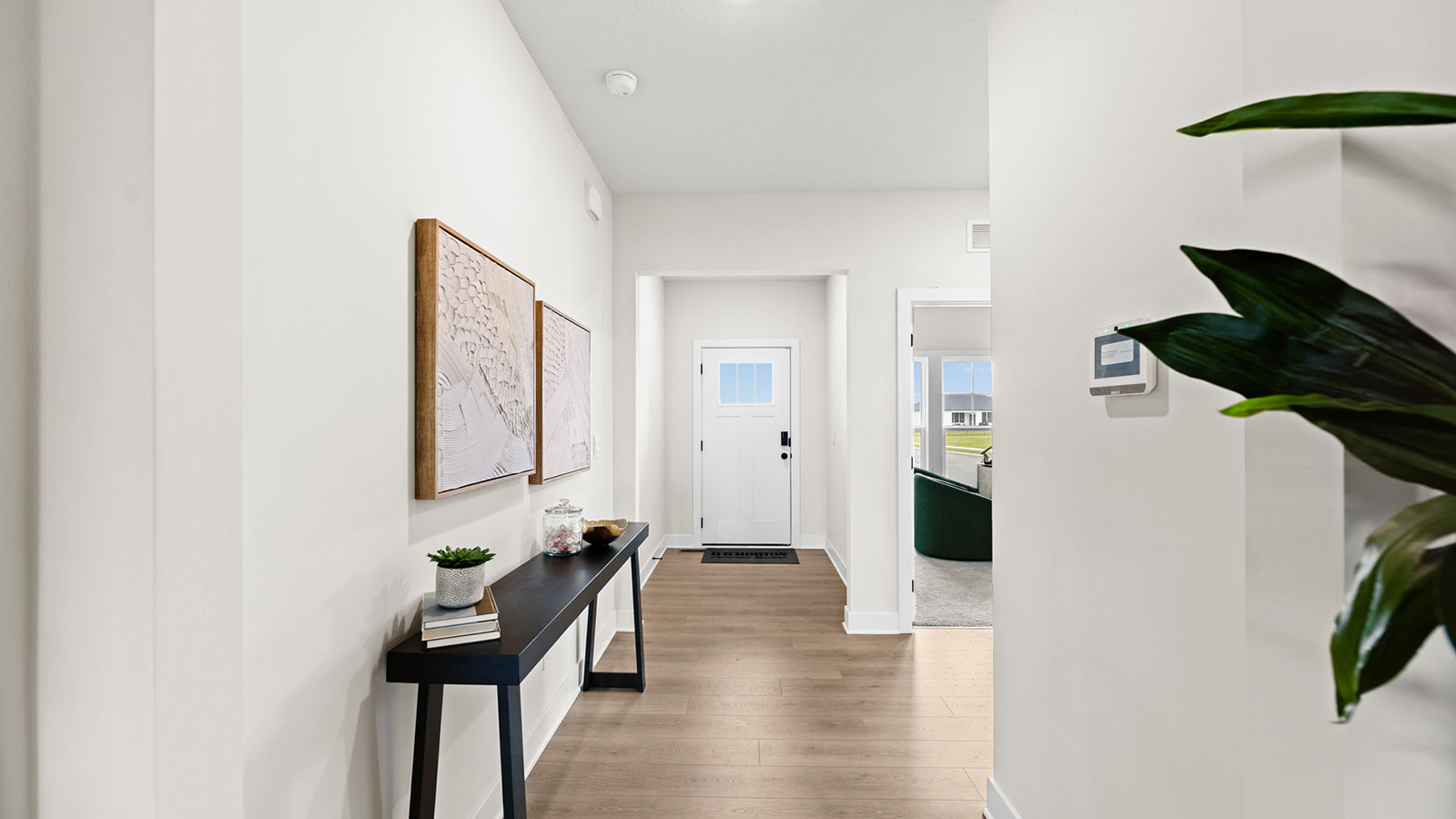 Welcoming foyer with view of front door