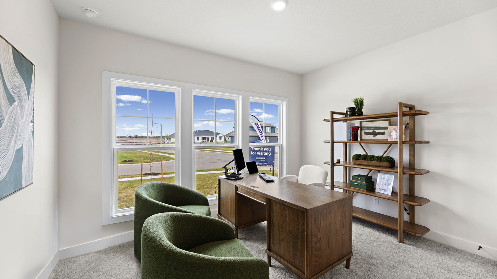 Carpeted bedroom with large window