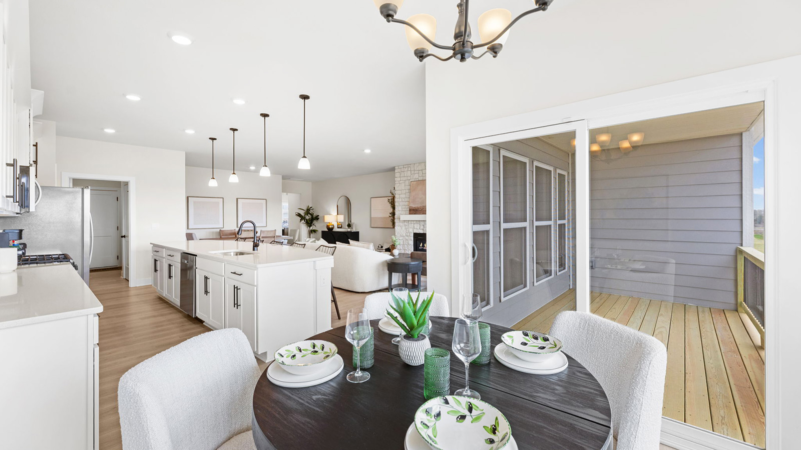 Breakfast nook off of kitchen with glass sliding door