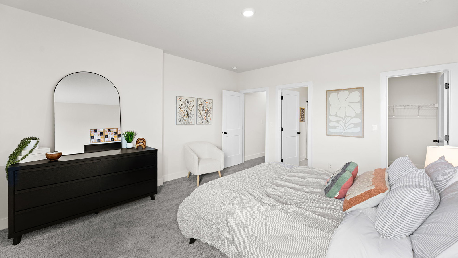 Carpeted bedroom with large window