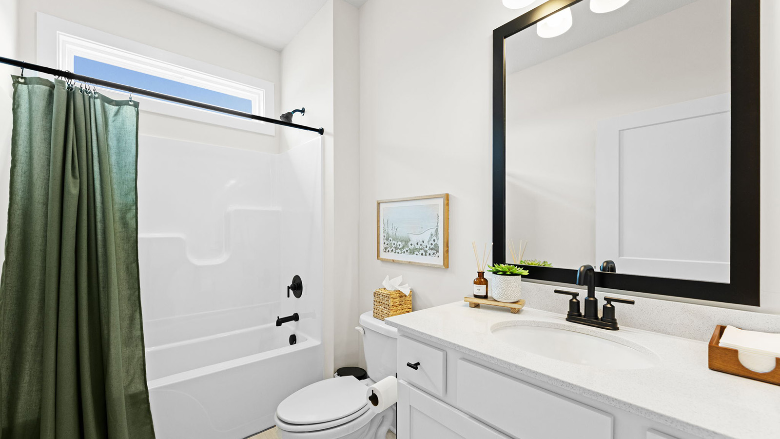 Bathroom with a bathtub shower combination