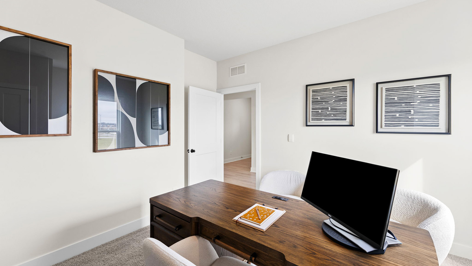 Carpeted bedroom with large window