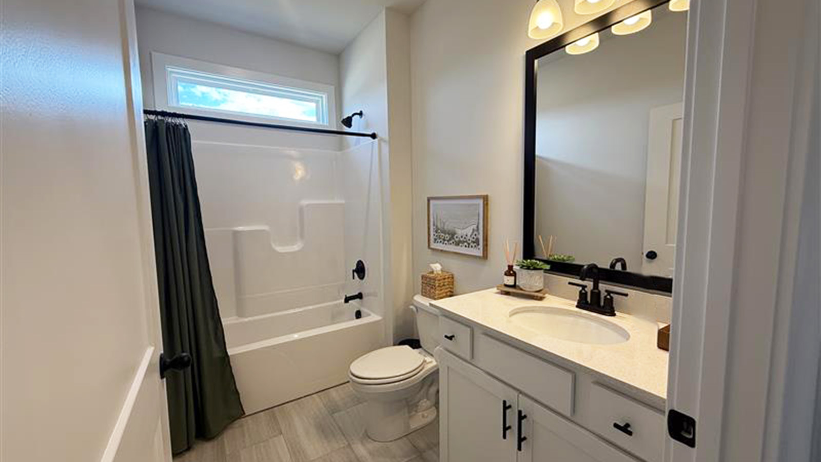 Bathroom with bathtub and shower combination