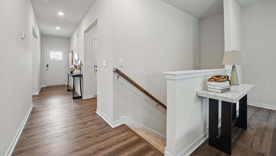 Welcoming foyer with view of home interior