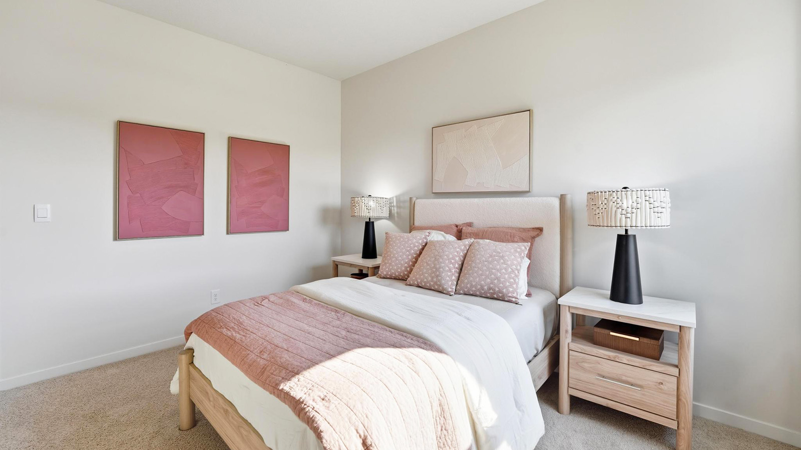 Carpeted bedroom with large window