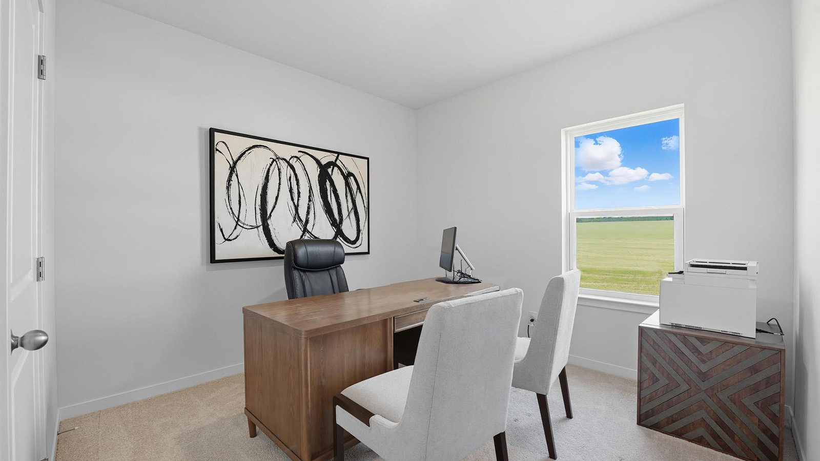 Carpeted bedroom with large windows