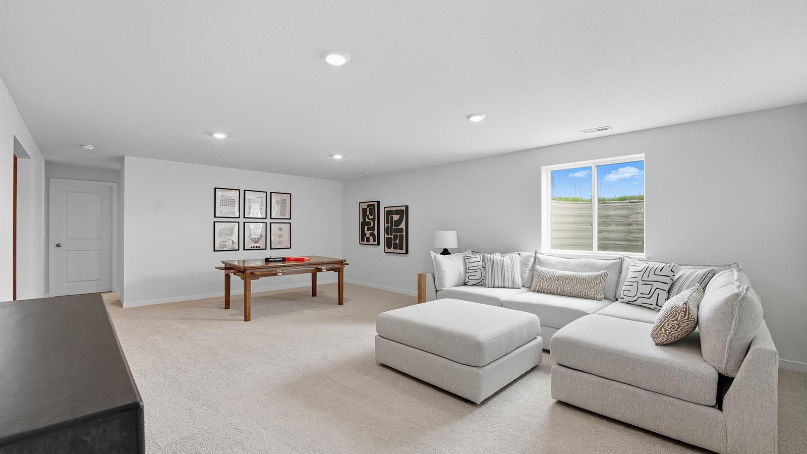 Carpeted basement landing