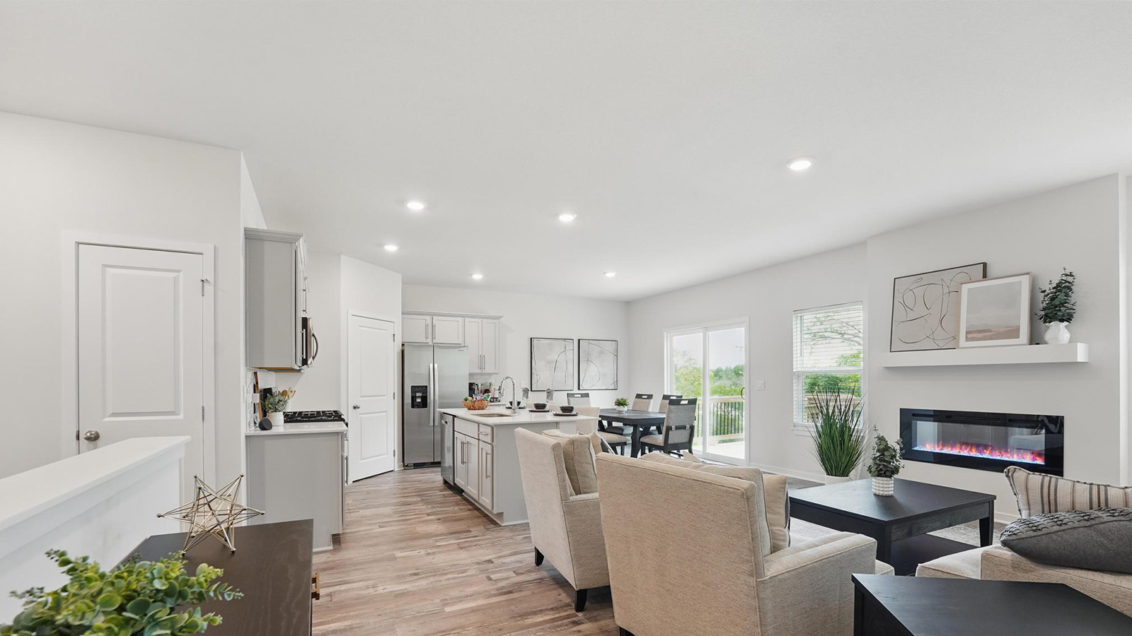 Living room with electric fireplace. New Homes in Kansas City, Missouri