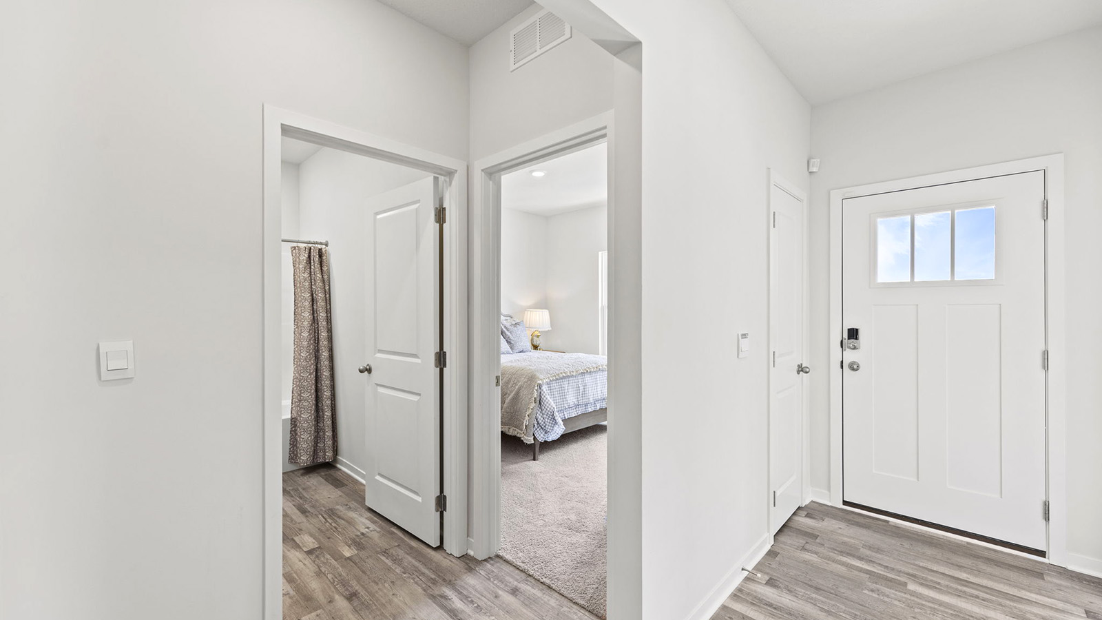 Welcoming foyer with view of front door