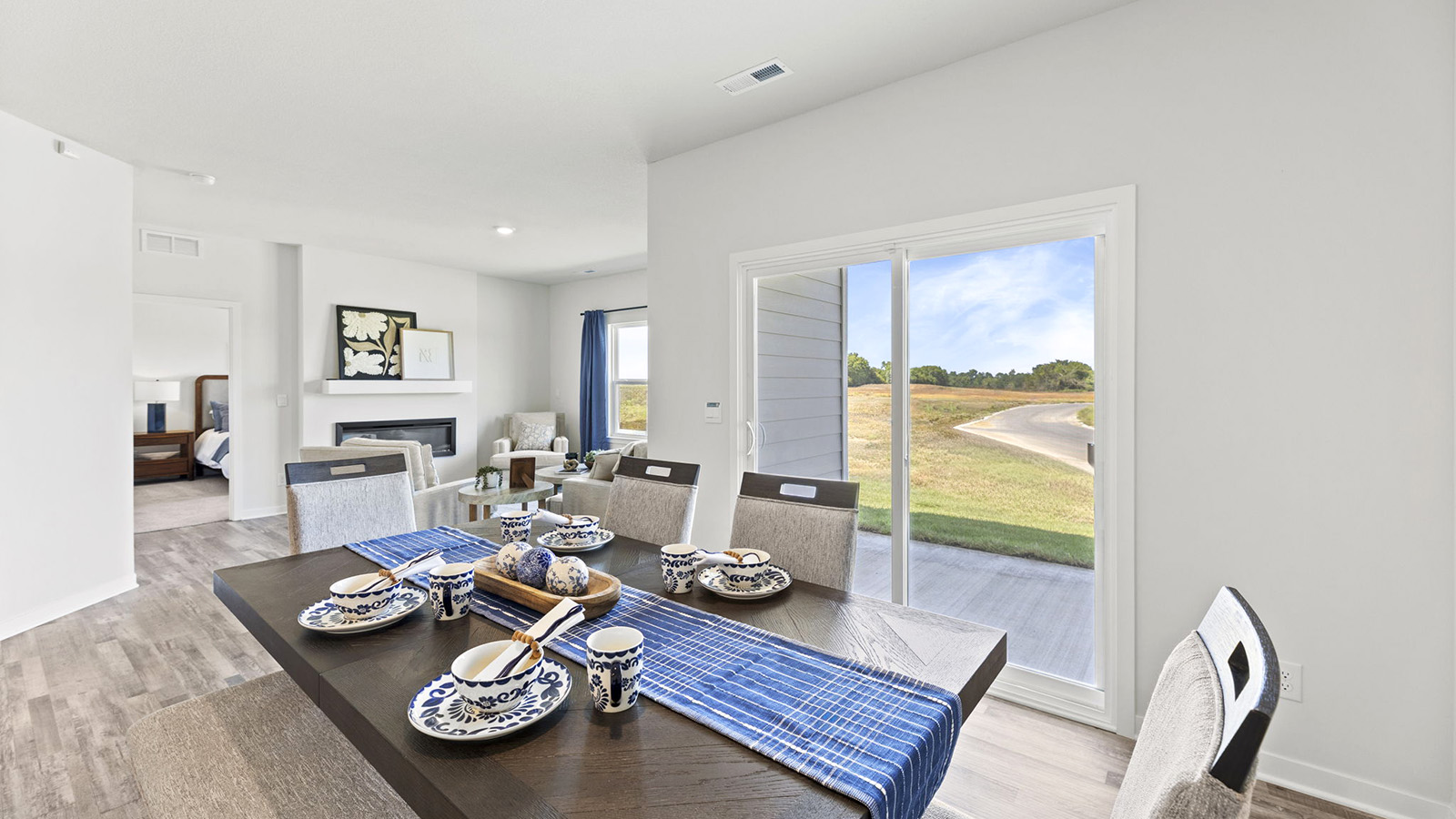 Dining area off of kitchen with glass sliding door