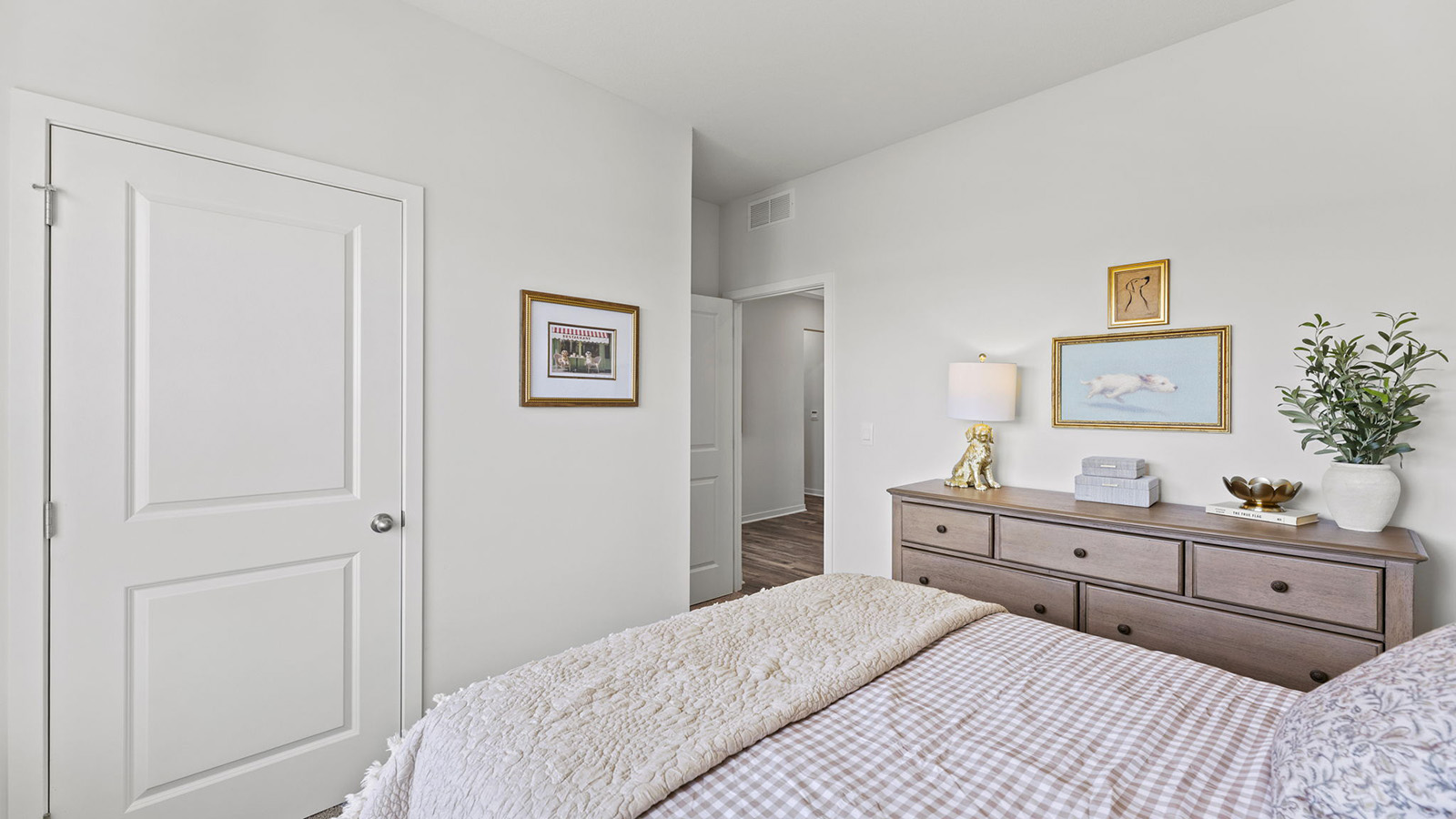 Carpeted bedroom with large window