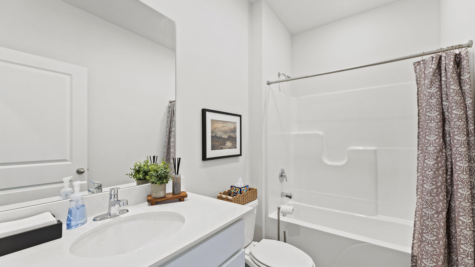 Bathroom with shower and tub combo