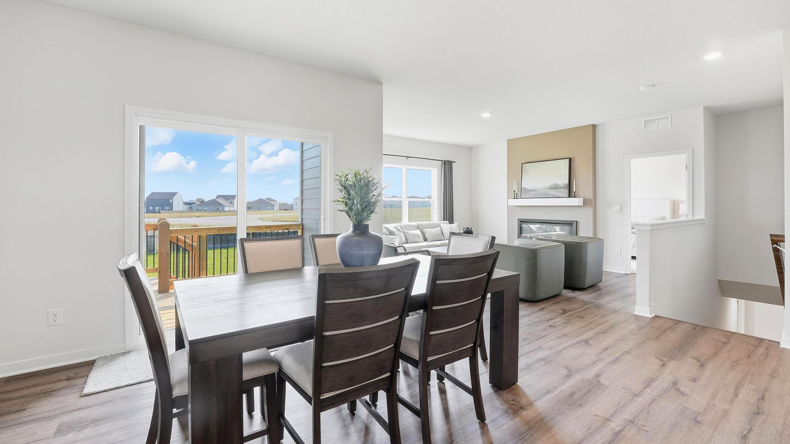Dining area off of kitchen with glass sliding door