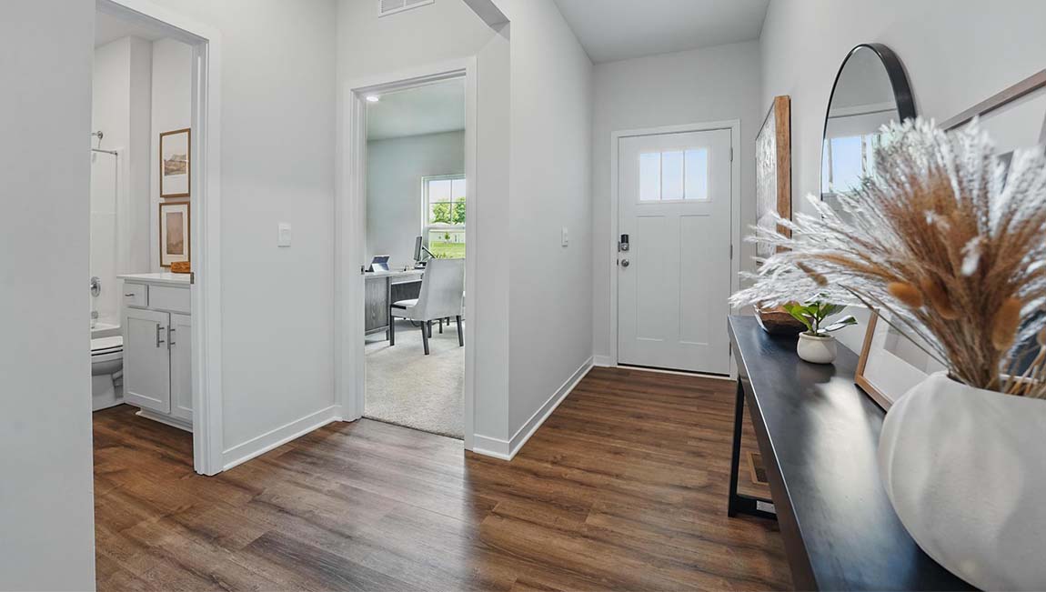 Welcoming foyer with view of home interior