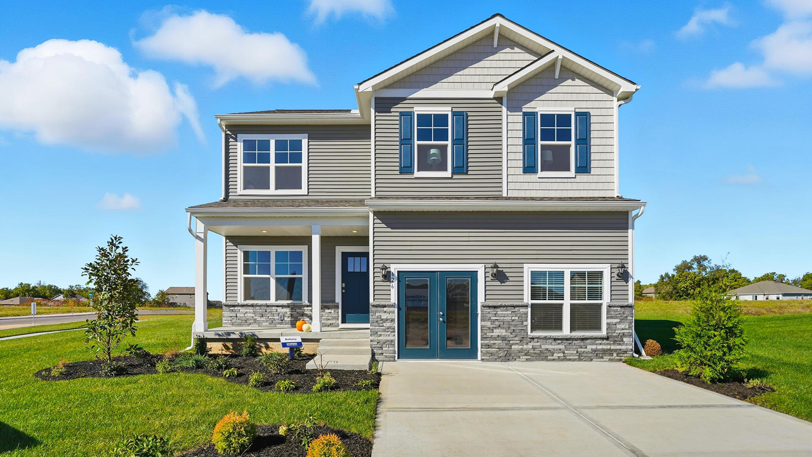 Bellamy front exterior rendering with siding, stone, and two car garage, new homes in Kansas City, MO