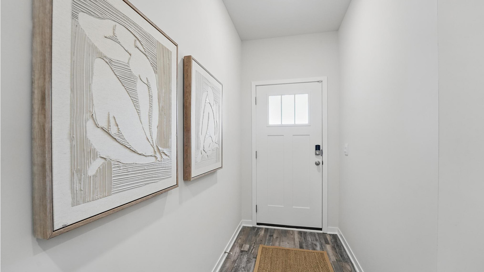 Welcoming foyer with view of home interior