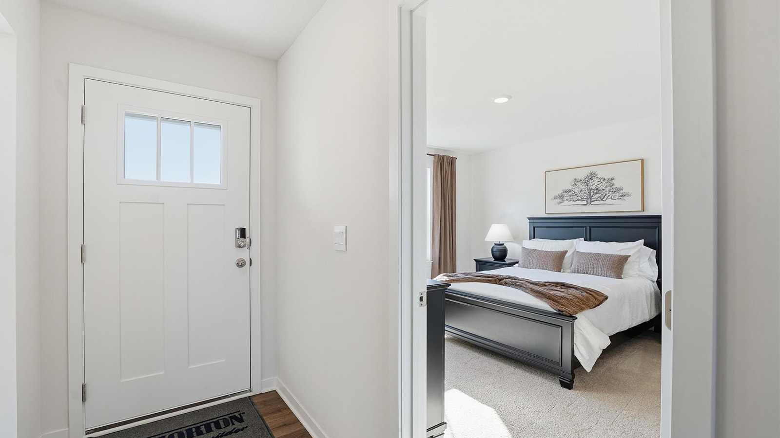 Welcoming foyer with view of home interior