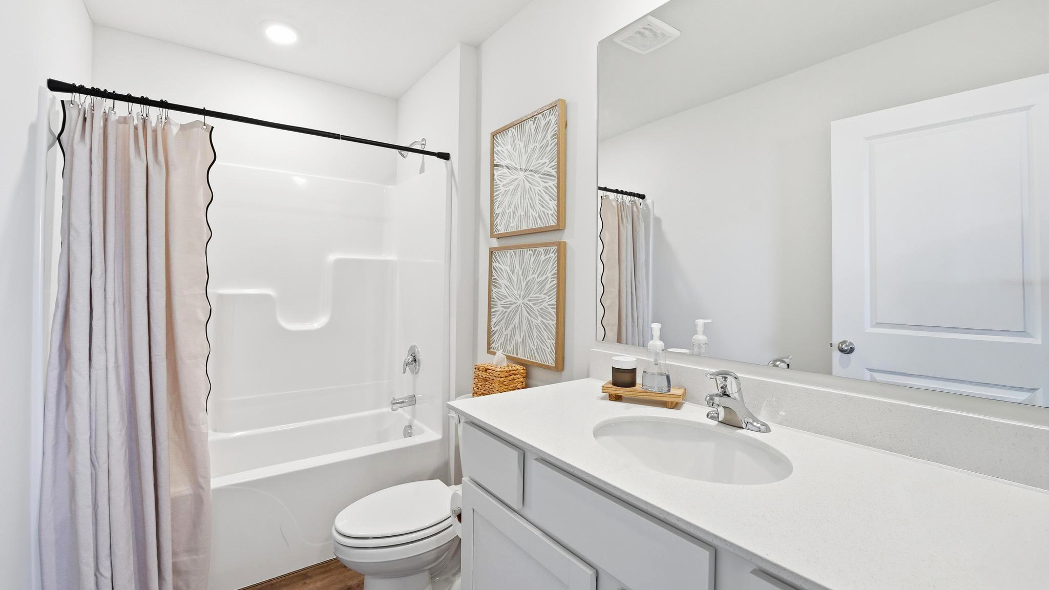 Bathroom with a bathtub shower combination