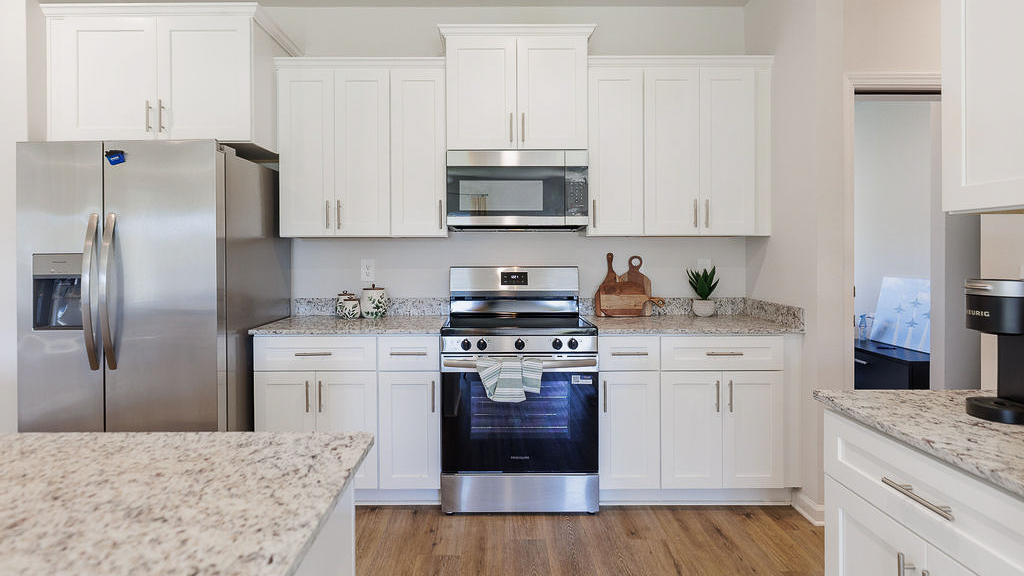 The Belfort is a 4-bedroom, 2.5-bathroom two-story home with over 2200 Sq. Ft. and a two-car garage