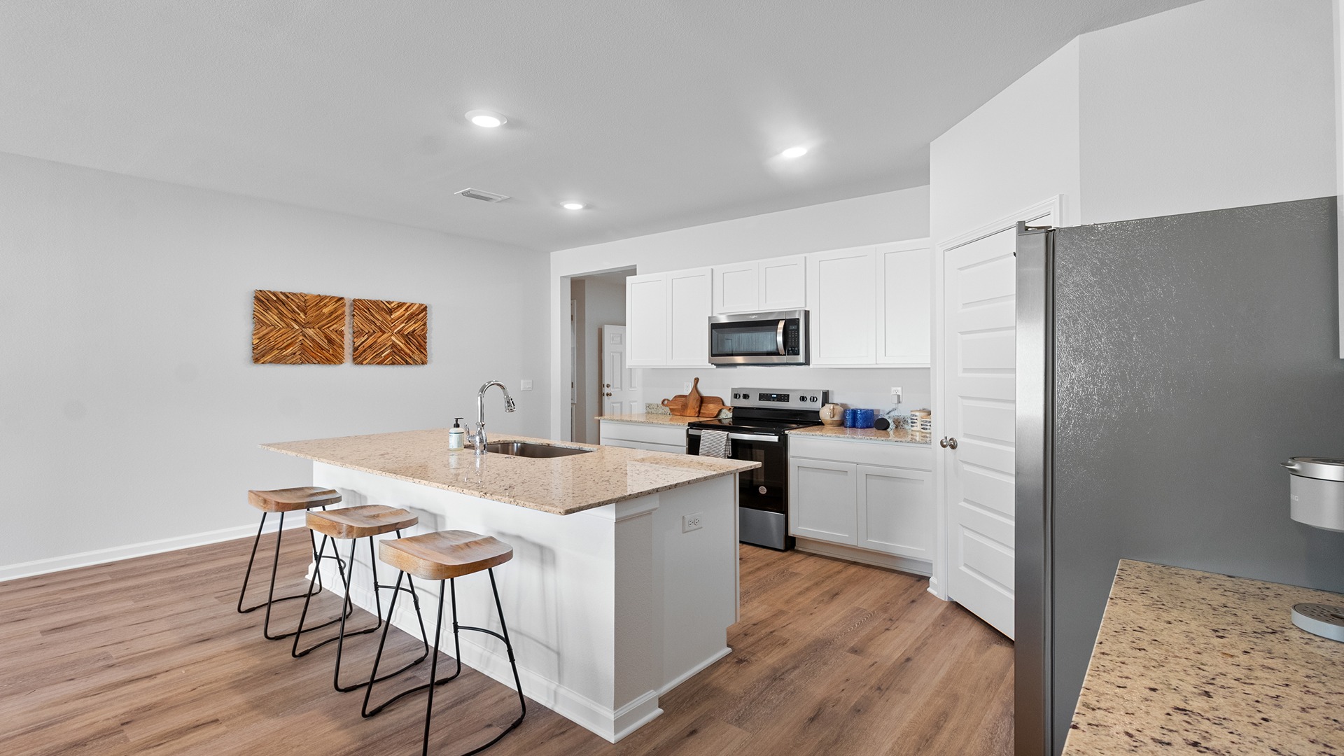 The one-level Beau plan is a spacious, 4-bedroom, 2 bath design in 1,799 square feet