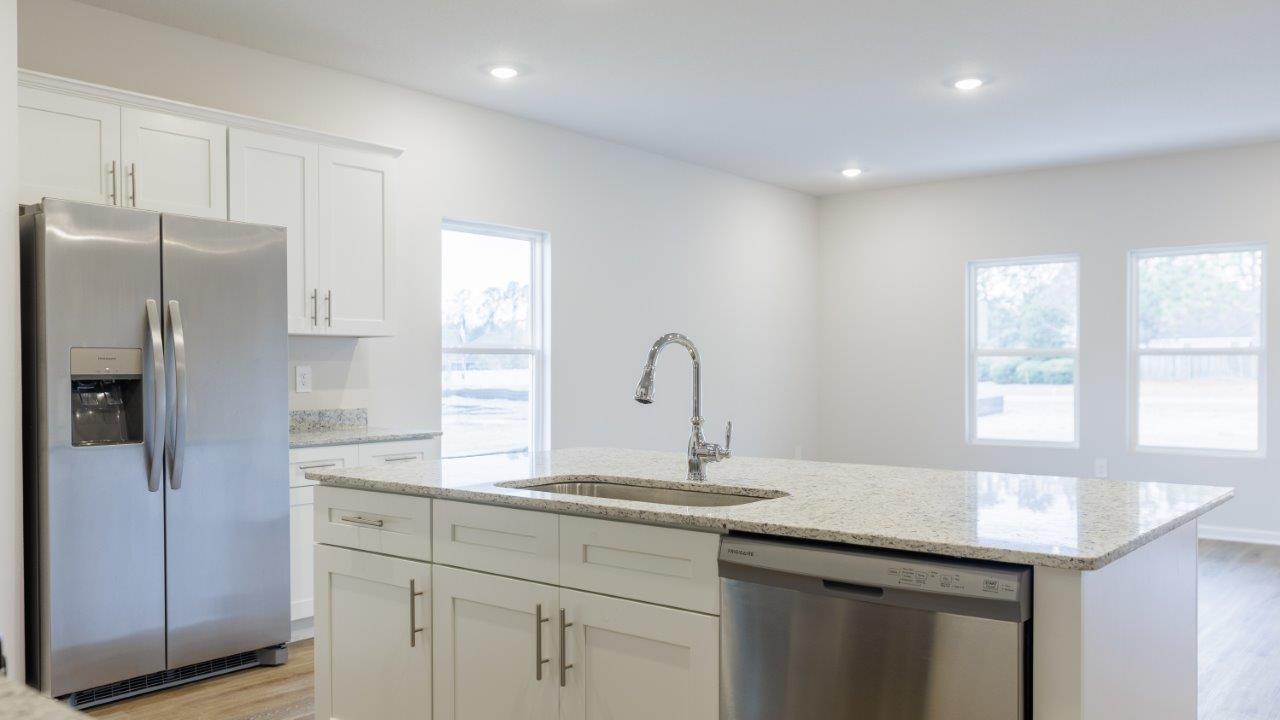 The Ozark features 4 bedrooms, 3 bathrooms, and approximately 2,458 square feet