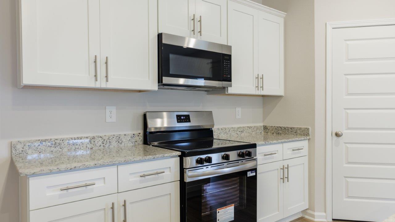 The Ozark features 4 bedrooms, 3 bathrooms, and approximately 2,458 square feet