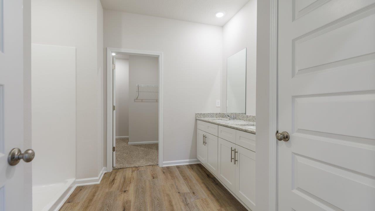 The Ozark features 4 bedrooms, 3 bathrooms, and approximately 2,458 square feet