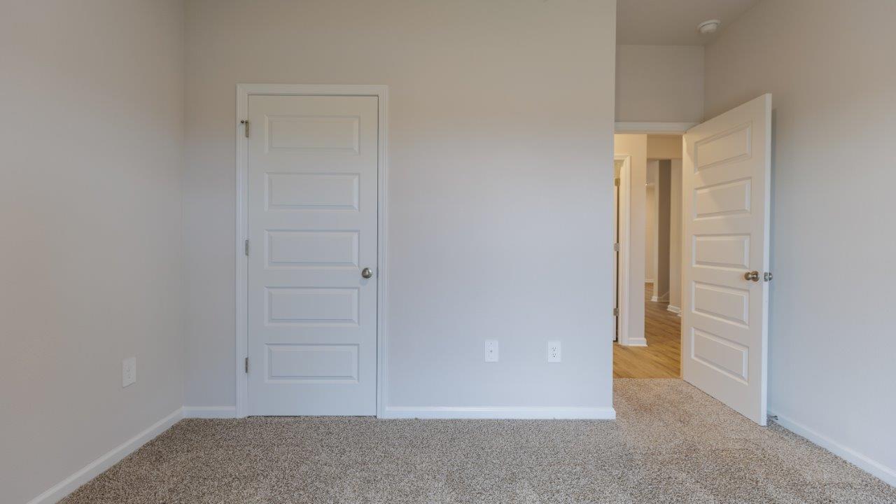 The Ozark features 4 bedrooms, 3 bathrooms, and approximately 2,458 square feet