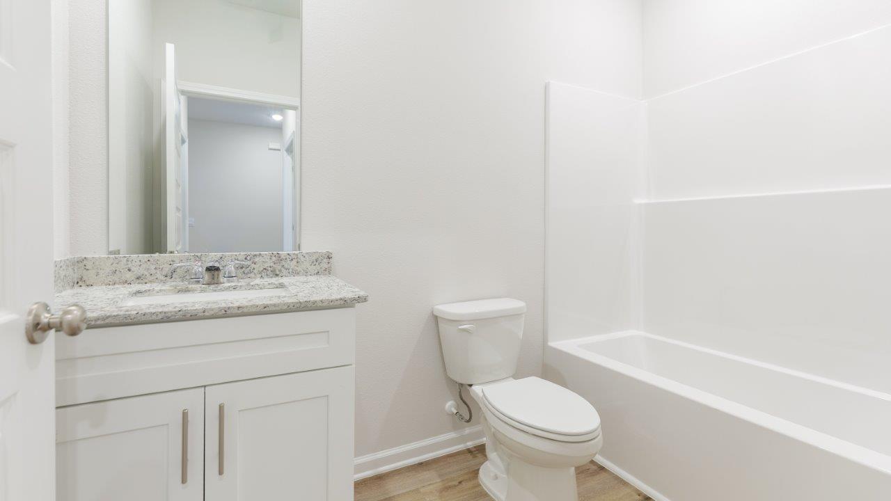 The Ozark features 4 bedrooms, 3 bathrooms, and approximately 2,458 square feet