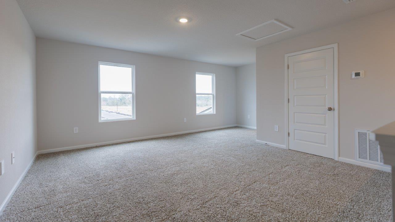 The Ozark features 4 bedrooms, 3 bathrooms, and approximately 2,458 square feet