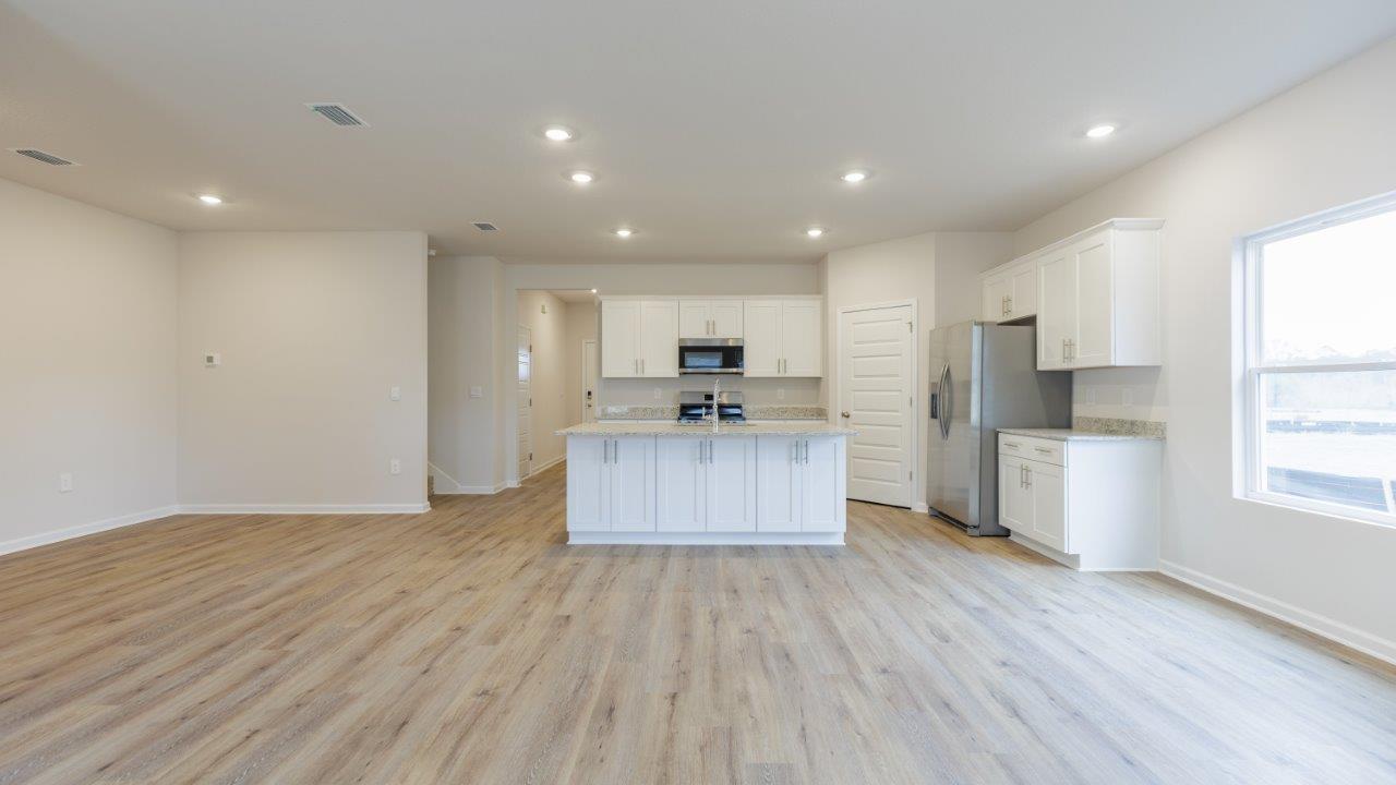 This floorplan features 4 bedrooms, 3 bathrooms, and approximately 2,458 square feet.