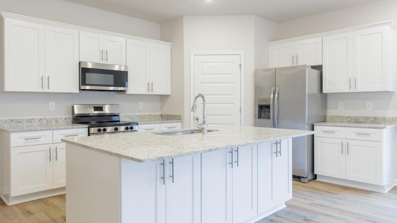 This floorplan features 4 bedrooms, 3 bathrooms, and approximately 2,458 square feet.