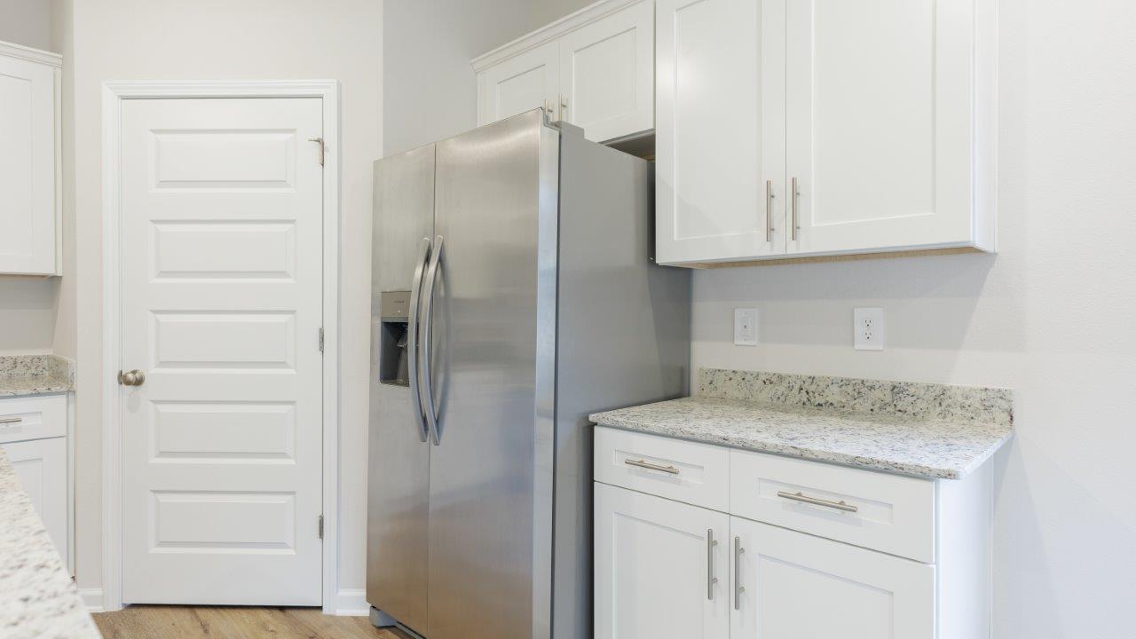 This floorplan features 4 bedrooms, 3 bathrooms, and approximately 2,458 square feet.