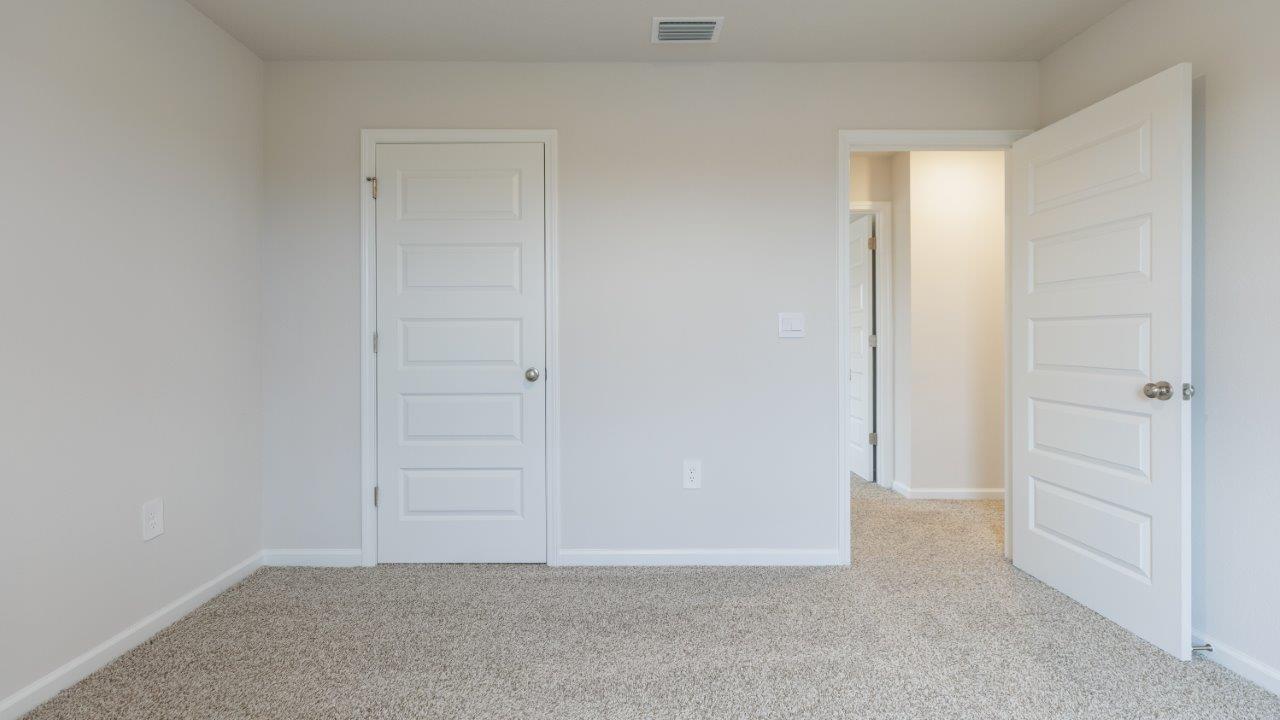 This floorplan features 4 bedrooms, 3 bathrooms, and approximately 2,458 square feet.