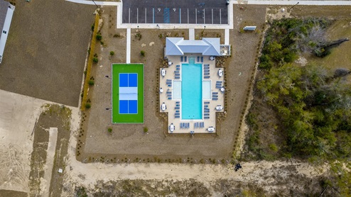 Ariel view of the pool and pickle ball court