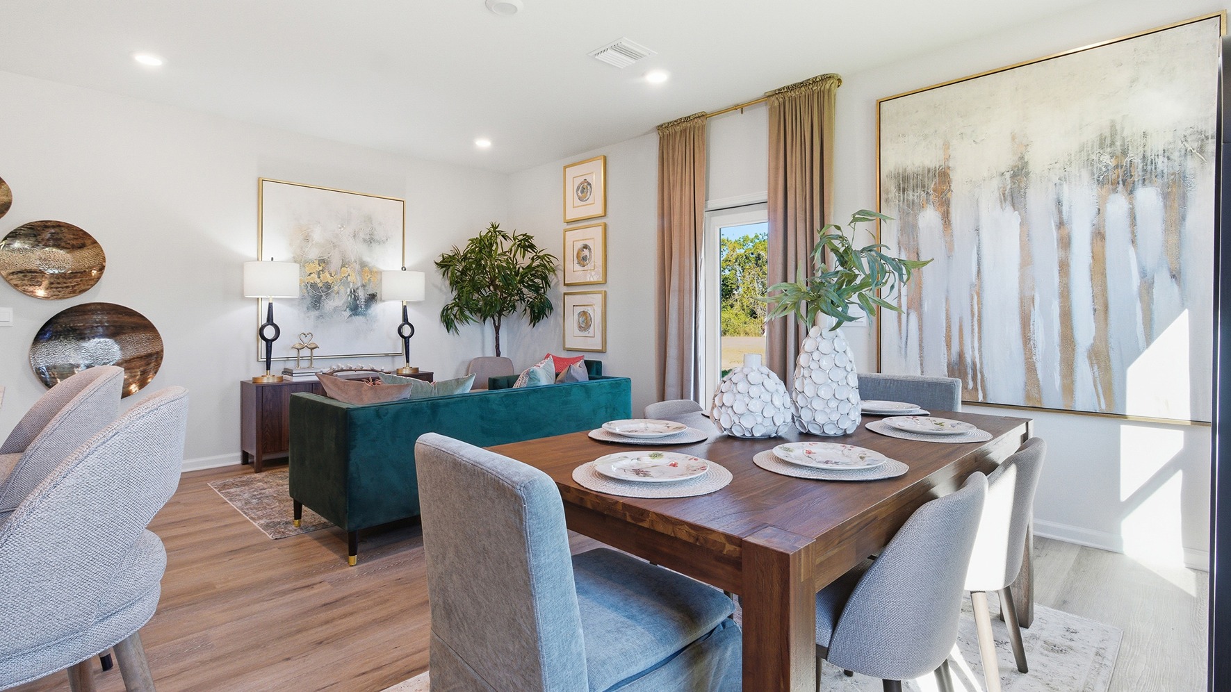 a modern and spacious 3-bedroom, 2 ½-bathroom end-unit townhome